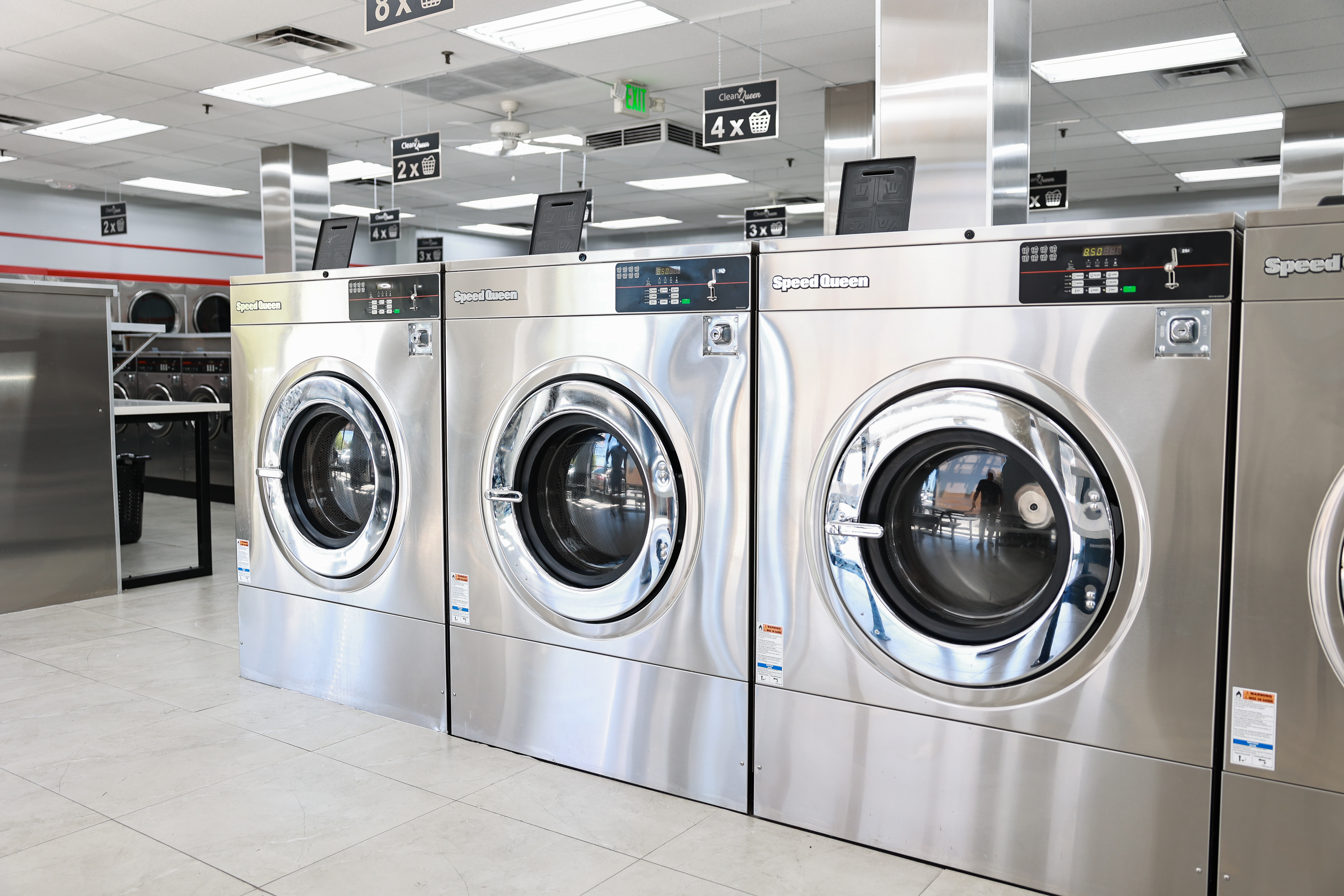 Large-capacity front-load washers at Clean Queen Laundry in Lincoln Heights